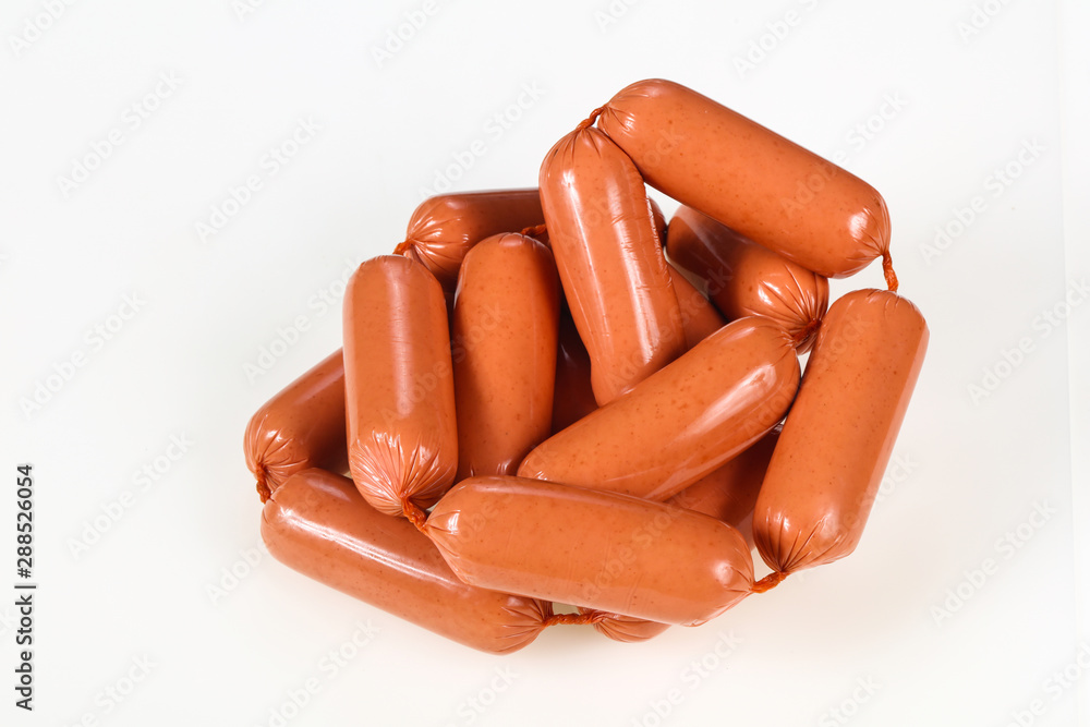 Tasty meat sausages over white background Tasty meat sausages over white background