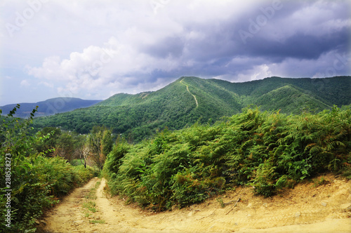 thick clouds over the hills