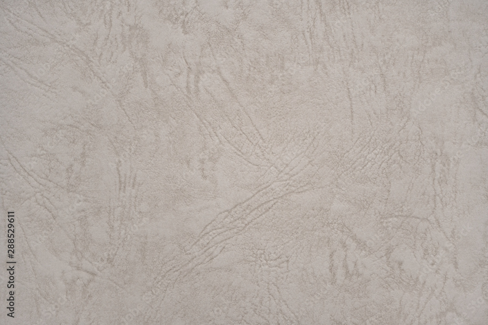 Fototapeta premium Abstract beige leather texture paper background or backdrop. Empty old cream parchment sheet for decorative design element. Light brown crumpled surface for journal template presentation.