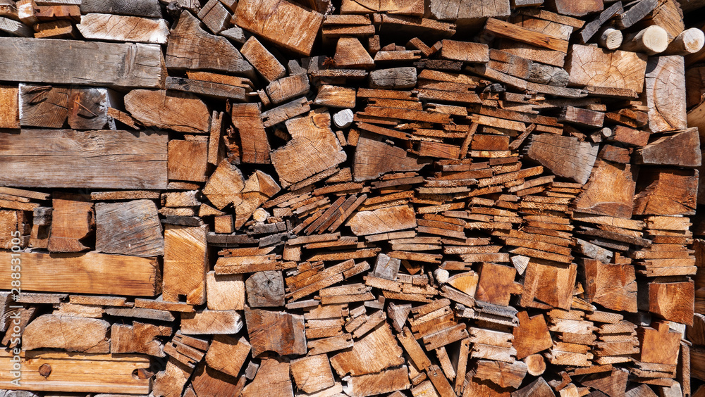 Large pile of sawn wood in different sizes and shapes Large pile of sawn wood in different sizes and shapes