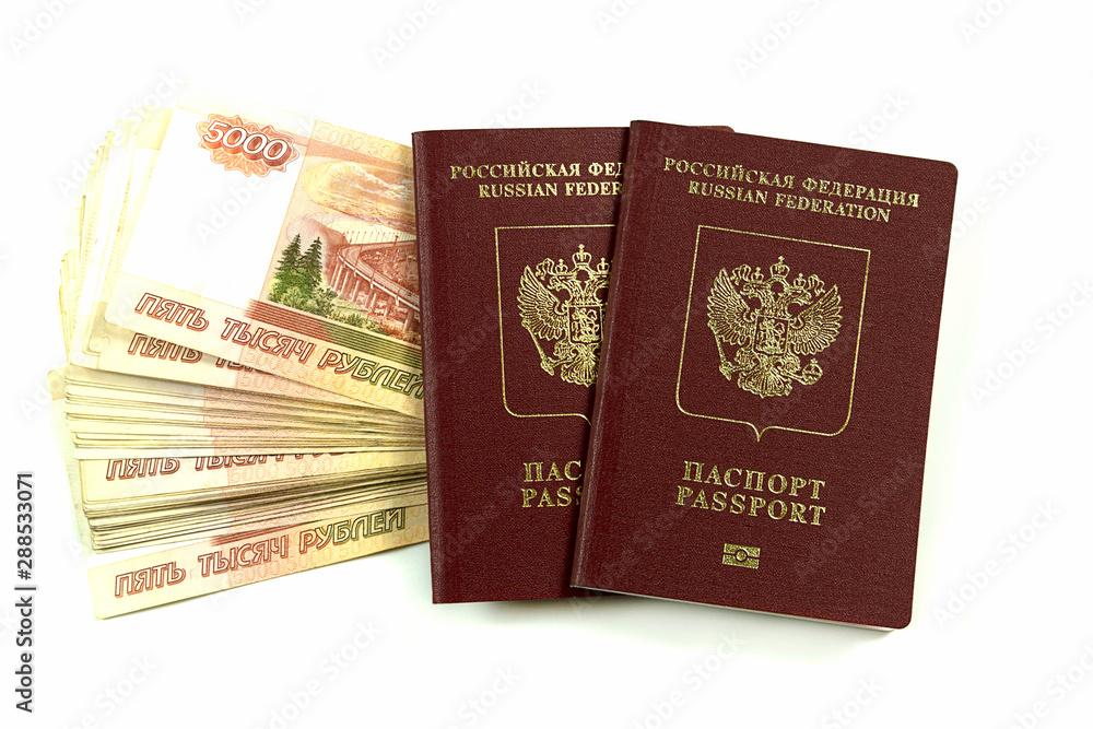 Two Russian passports with denominations of five thousand rubles. Traveling abroad during your vacation. Two Russian passports with denominations of five thousand rubles. Traveling abroad during your vacation.