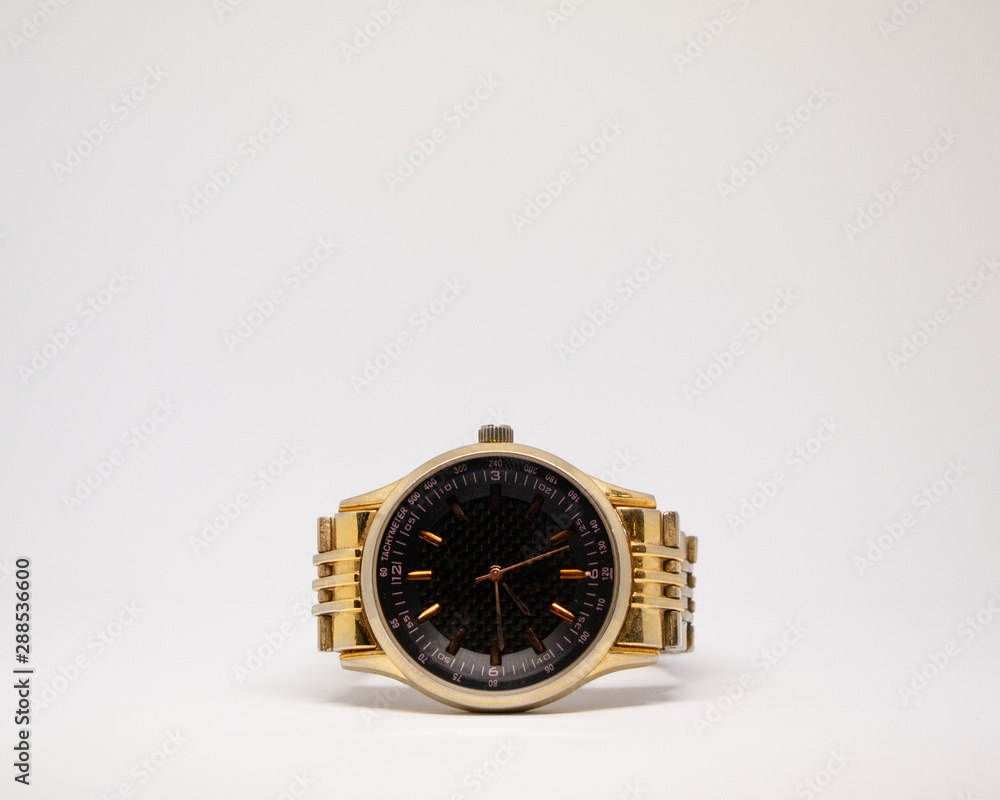 Gold watch on a white background Gold watch on a white background