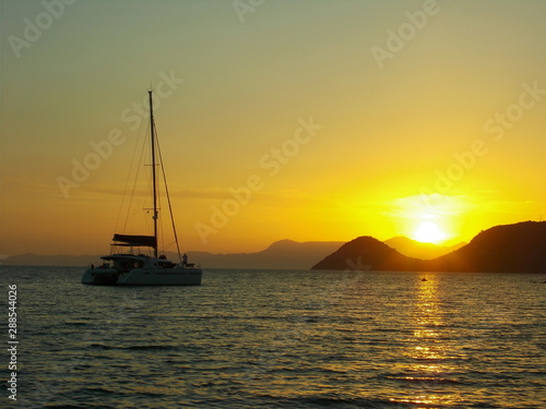 sailboat at sunset © William Richardson