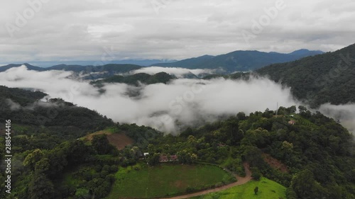 High angle viewpoint over rainforest mountains in Thailand.
