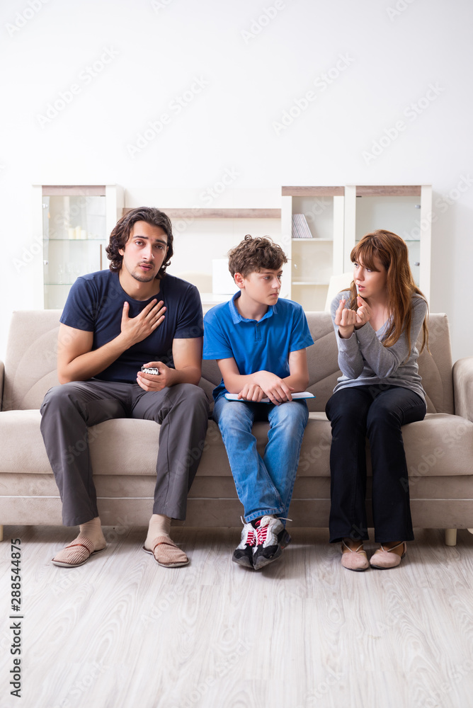 Concept of underage smoking with young boy and family Concept of underage smoking with young boy and family