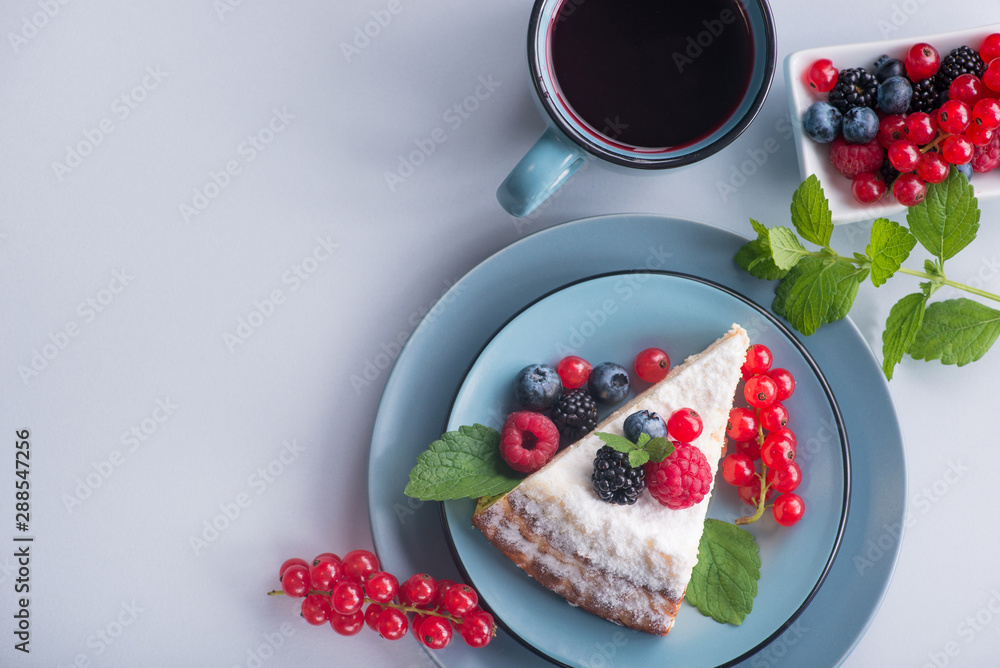 Sweet dessert cake with fresh blackberry, raspberry, currants and blueberry Sweet dessert cake with fresh blackberry, raspberry, currants and blueberry