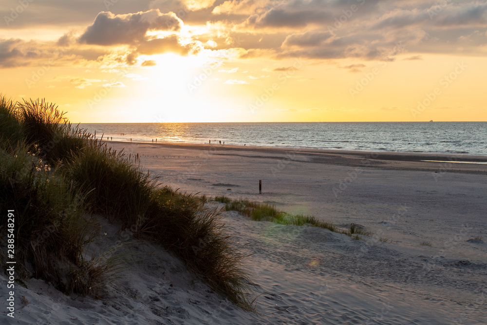 Sunset at the beach, Wadden Sea, North Sea in summer