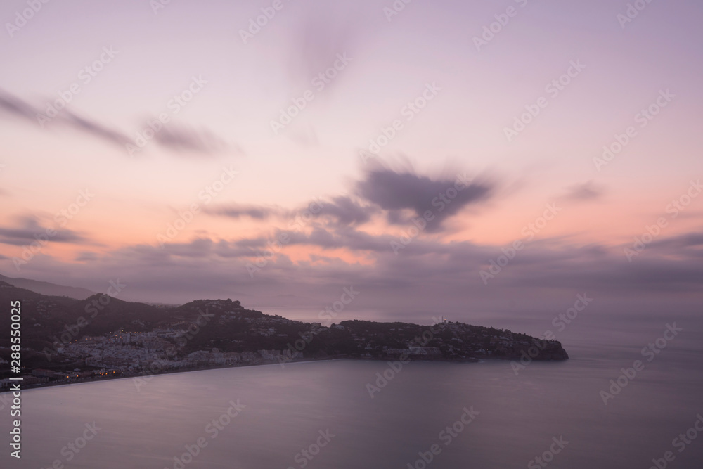 Fototapeta premium Beautiful sunrise on the Costa Tropical of Granada, Views of La Herradura from Cerro Gordo.