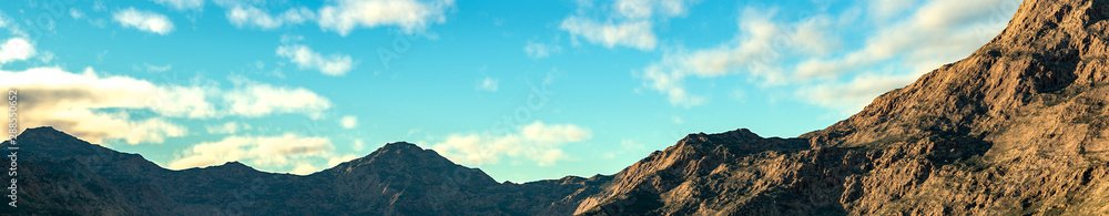 Fototapeta premium mountain landscape with cloudy blue sky