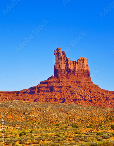 View of Monument Valley on a sunny day on the Highway 163 in Navajo Nation Reservation in USA. © Javen