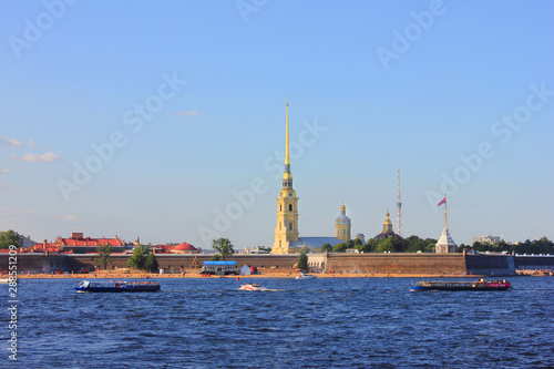 Peter and Paul fortress with Saints Peter and Paul cathedral spire view from Neva river in Saint Petersburg, Russia 