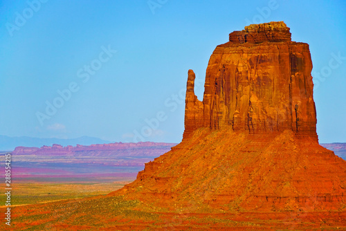 View of Monument Valley at sunset near the border of Arizona and Utah in Navajo Nation Reservation in USA.