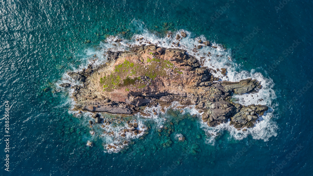 Drone view of a small rocky island at Guana Bay Saint Martin Sint Maarten - obrazy, fototapety, plakaty 
