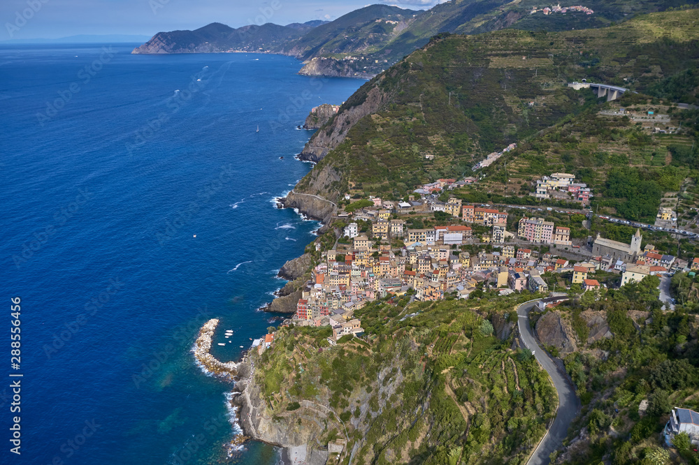 Panorama view of Corniglia village one of Cinque Terre in La Spezia, Italy. Flight by a drone.