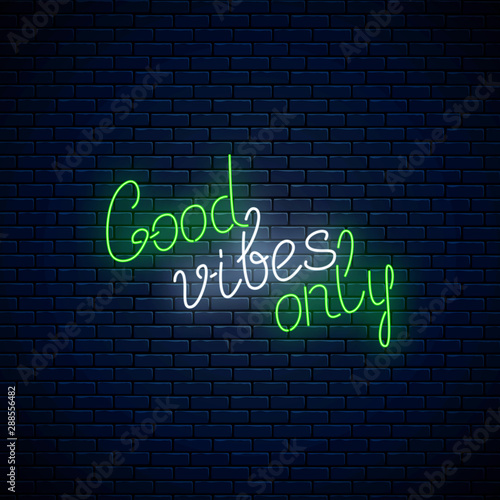 Good vibes only - glowing neon inscription handwriting phrase. Motivation quote in neon style. Vector illustration.