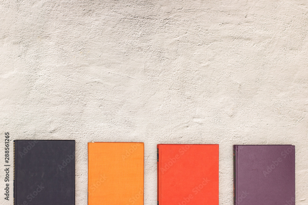 Fototapeta premium Colorful books for reading on the table 