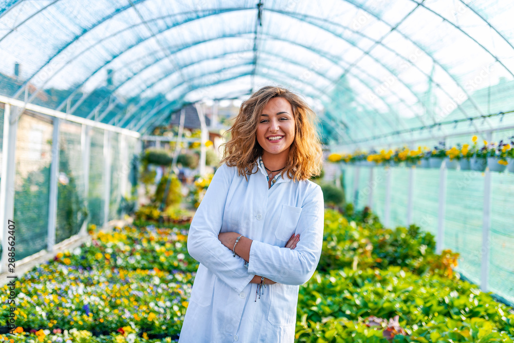 Researcher botanical research wearing a white coat.