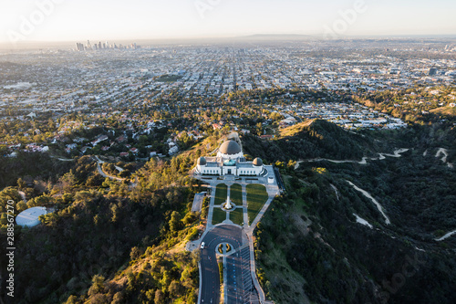 Fototapeta Early morning aerial above popular Griffith Park in Los Angeles, California