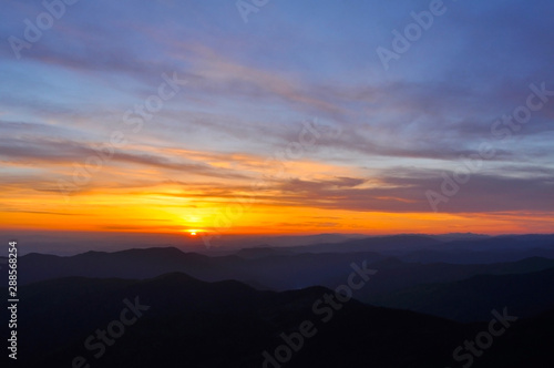 incredibly beautiful landscape of mountains sunset or sunrise high in the mountains. © cenchild