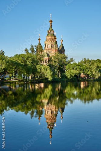 Russia. Peterhof. View of the Cathedral of St. Peter and Paul through Holguin Pond