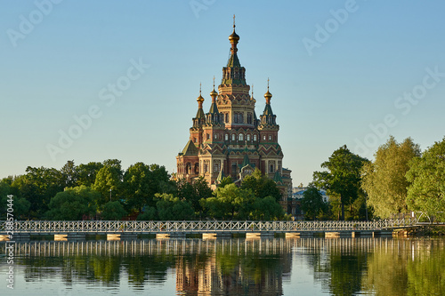 Russia. Peterhof. Holguin Pond. Cathedral of St. Peter and Paul behind the bridge