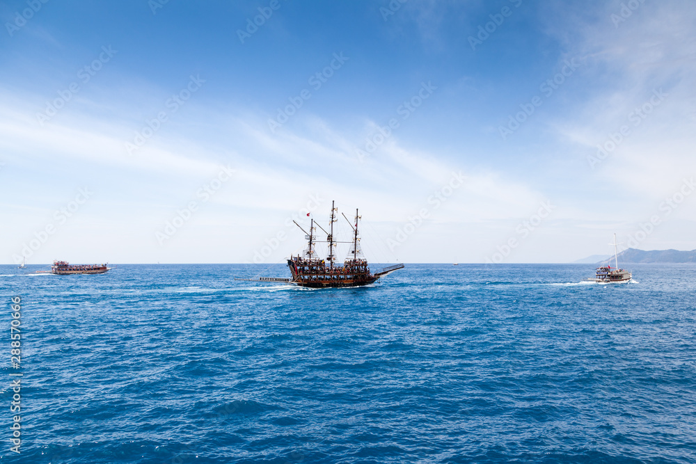 Sailing old ships in a sea
