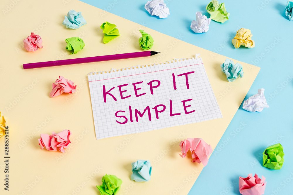 Text sign showing Keep It Simple. Business photo text to make something easy to understand and not in fancy way Colored crumpled papers empty reminder blue yellow background clothespin Text sign showing Keep It Simple. Business photo text to make something easy to understand and not in fancy way Colored crumpled papers empty reminder blue yellow background clothespin