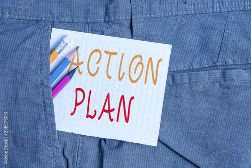 Word writing text Action Plan. Business photo showcasing detailed plan outlining actions needed to reach goals or vision Writing equipment and white note paper inside pocket of man work trousers