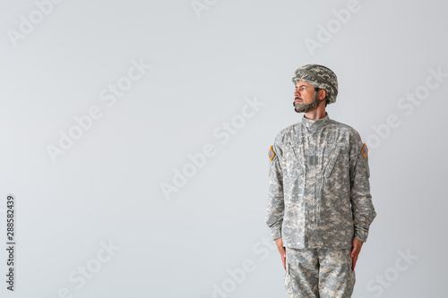 Soldier in camouflage on li...