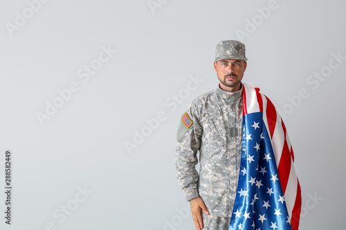 Soldier with national flag ...