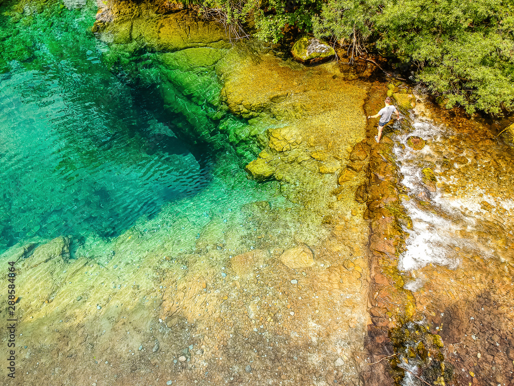 Natural blue hole karst source Oko Skakavice in Montenegro, Europe