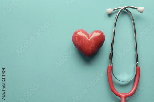 Fototapeta Naklejka Na Ścianę i Meble -  Red heart with stethoscope, heart health,  health insurance concept, World heart day, world health day