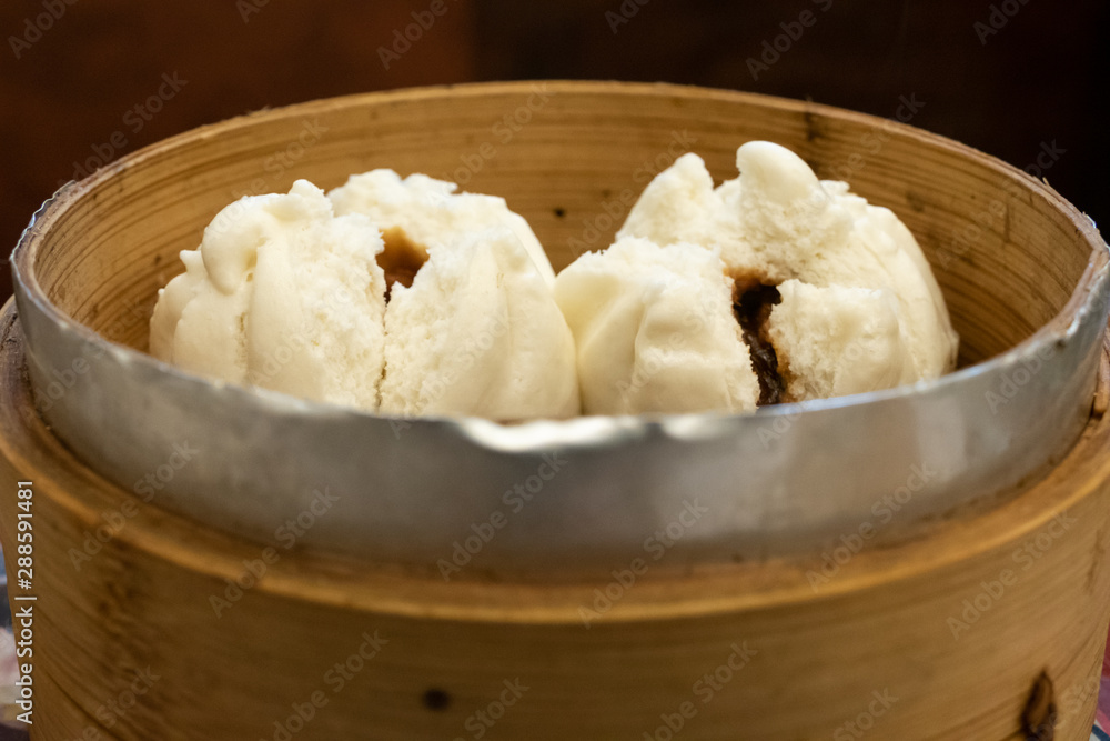 Cantonese dim sum in bamboo steamer Cantonese dim sum in bamboo steamer