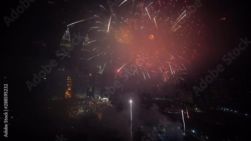 Kuala Lumpur, Malaysia - August 31, 2019: 4k establishing cinematic b-roll footage of fireworks show at Kuala Lumpur on the eve of Independence Day (merdeka) celebration. 