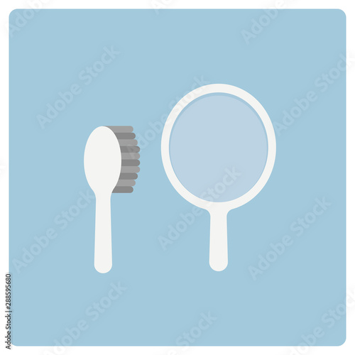 White hand mirror and hairbrush
