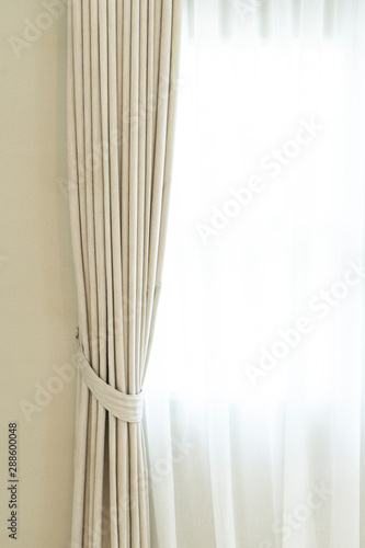 Close up of white modern curtain detail of Holder, interior detail.