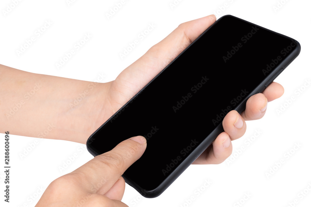 Close up adult woman hand holding and touching screen on the modern black smartphone mock up in vertical position with blank screen isolated on white background with clipping path. Close up adult woman hand holding and touching screen on the modern black smartphone mock up in vertical position with blank screen isolated on white background with clipping path.