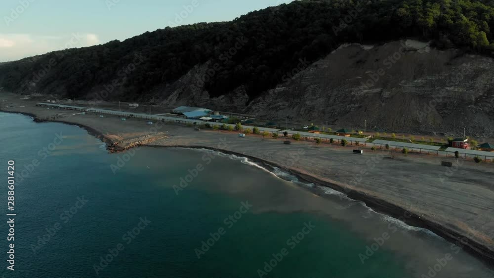 The coastline of the sea at dawn. Aerial Video Filming The coastline of the sea at dawn. Aerial Video Filming