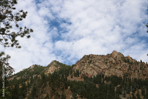 rocky mountain against a cloudy sky