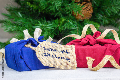 Fotografija Reusable fabric wrapping for gifts, sustainable living concept, zero waste, recy