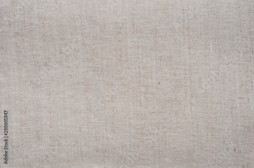 Gray beige fabric texture background. Tablecloth. Natural linen fabric. factory