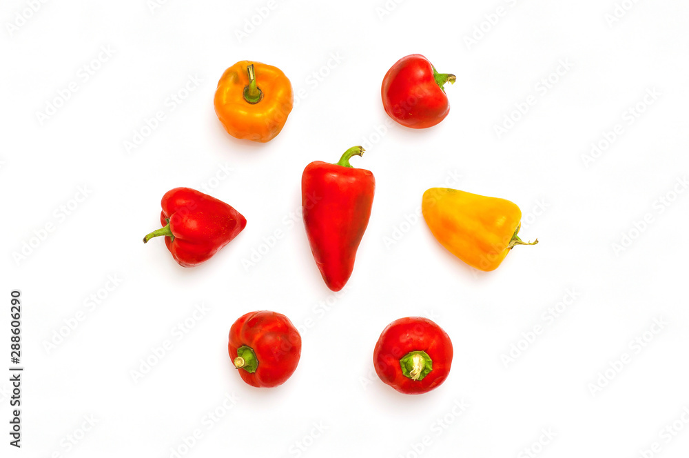 Bulgarian red and yellow peppers in the shape of a circle isolated on white background. Sweet pepper. Top View. Flat lay Bulgarian red and yellow peppers in the shape of a circle isolated on white background. Sweet pepper. Top View. Flat lay