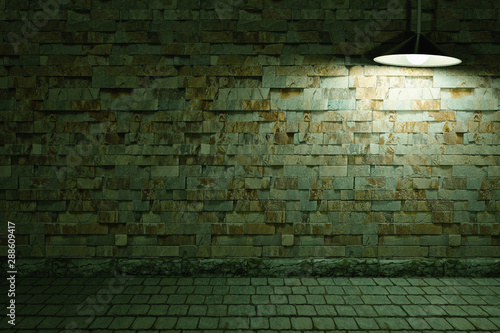 3d renderingWall masonry  Illuminated by a lantern on the right side3