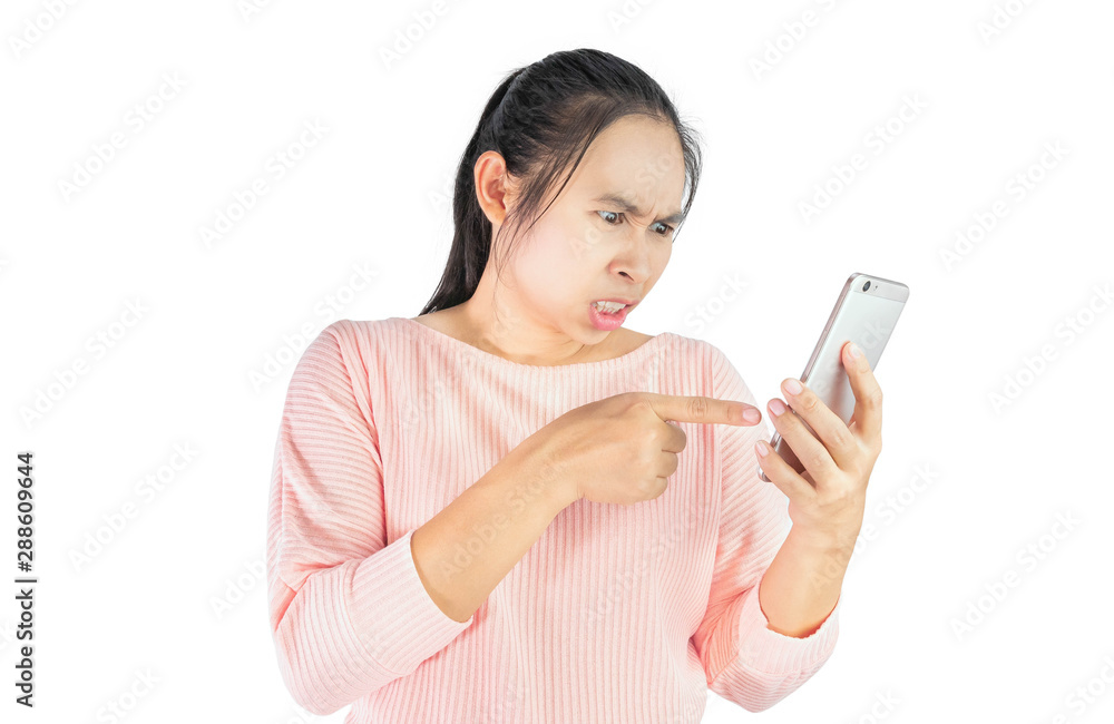 Asian woman angry and furious what she see in the smartphone, Isolated on white background. Asian woman angry and furious what she see in the smartphone, Isolated on white background.