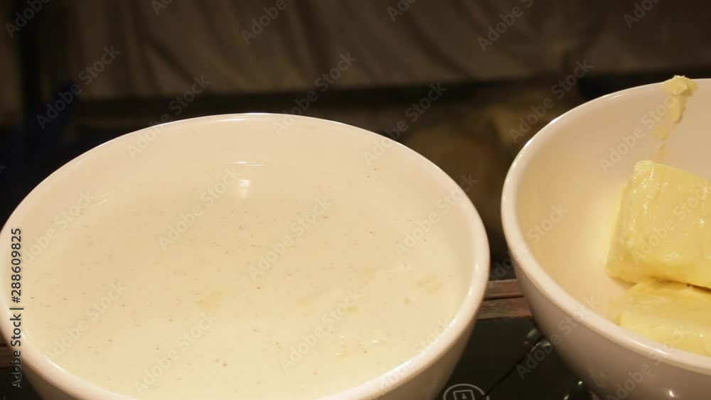 butter slices with sweet soup in white bowl butter slices with sweet soup in white bowl
