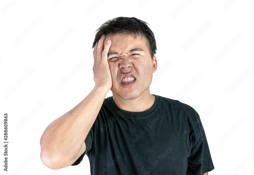 Asian man suffering from headache wearing black t-shirt isolated on white background. Asian man suffering from headache wearing black t-shirt isolated on white background.