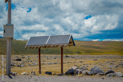 Modern large-scale photovoltaic solar panels in the Andes Mountain range.