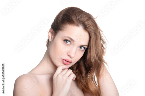 Close up portrait of beautiful young woman with perfect skin