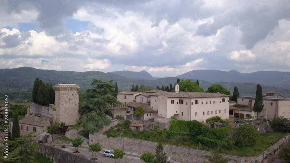 Drone aerial video of the small ancien Assisi village, in Umbria region, Italy at summer season.