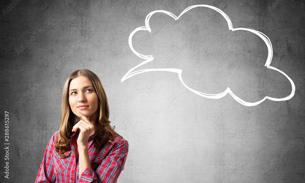 Brown haired woman looks pensively upwards Brown haired woman looks pensively upwards